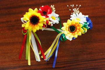 Circlet of sunflowers, chamomile and poppy