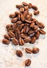 natural coffee beans on aged wood