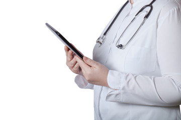 A woman in a white uniform robe with electronic device in her ha