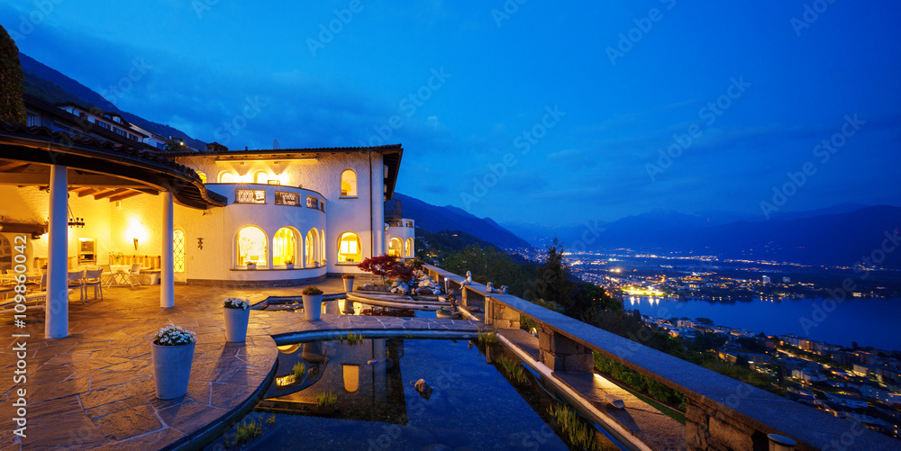 Wall mural exterior of a modern house in the night