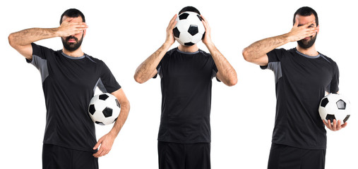 Football player covering his face