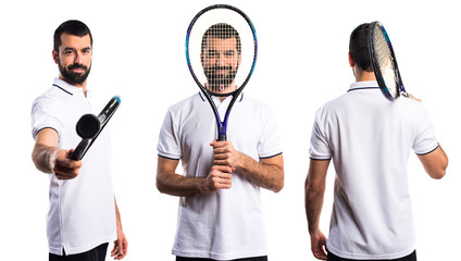 Tennis player hiding behind his racket