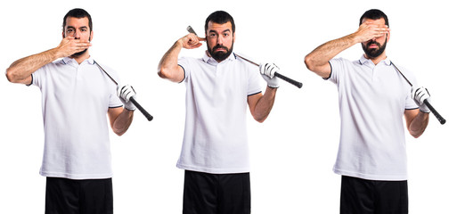 Golfer covering his ears