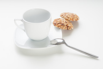 Empty white mug on white background
