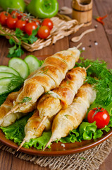 Kebab with tomatoes and cheese in pastry