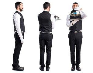 Luxury waiter holding a tray