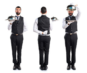 Luxury waiter holding a tray