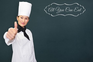 Composite image of smiling female cook gesturing thumbs up in ki