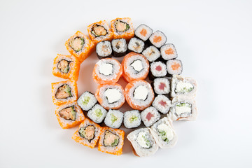 Japanese rolls on white background