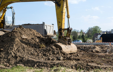 Fototapeta premium Yellow excavator 