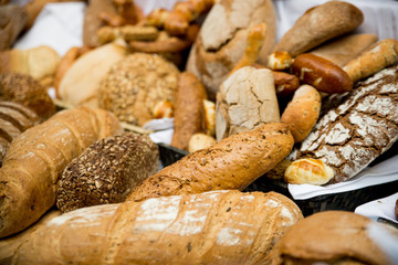 Fresh bread and pastry composed on the table