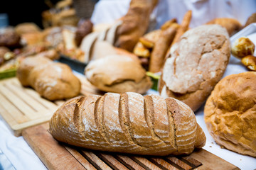 Fresh bread and pastry composed on the table