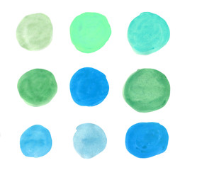 The circles in shades of blue and green of watercolor