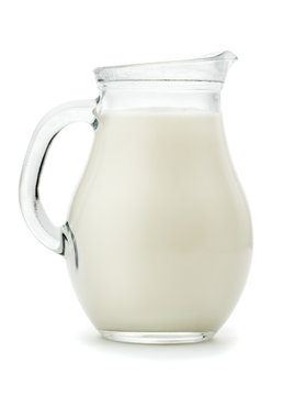 Natural whole milk in a  glass jug 