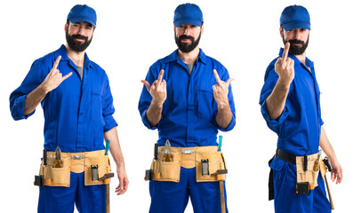 Plumber making horn gesture