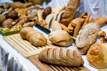 Fresh bread and pastry composed on the table