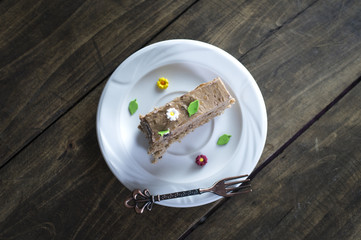 Delicious chocolate cakes on table