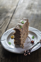 Delicious chocolate cakes on table