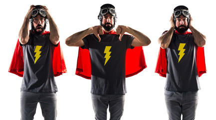 Superhero covering his ears