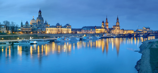 Fototapeta na wymiar Night panorama of Dresden Old town with reflections in Elbe rive