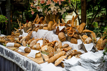 Fresh bread and pastry composed on the table
