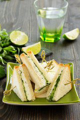 Vegetarian sandwich with cucumber and cream cheese.
