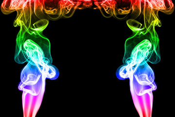 Rainbow smoke on black background with copy space, Abstract rainbow smoke in studio background with copy space for creative design