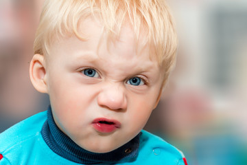 Funny baby grimaces.