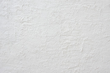 Blurred white stucco wall, abstract background.