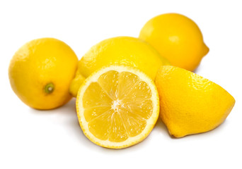 Fresh organic lemons, isolated on white background.