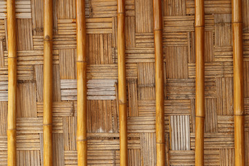 Grungy wicker bamboo panel background.