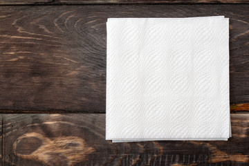 Paper  napkins on wooden surface