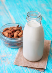 almond milk in a glass bottle
