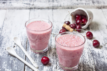 smoothie with cherry in a glass