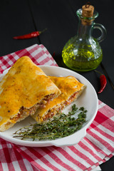 Pizza calzone with ham and cheese