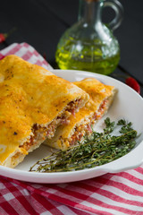 Pizza calzone with ham and cheese