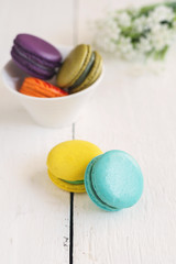 Colorful macaroons and a cup of coffee