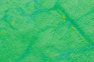 green painted crepe paper background