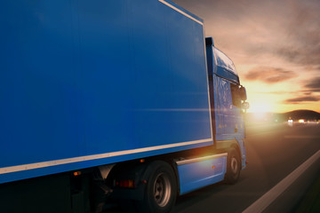 Truck with trailer on highway