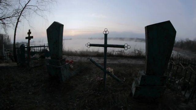 creepy cemetery monument in a fog