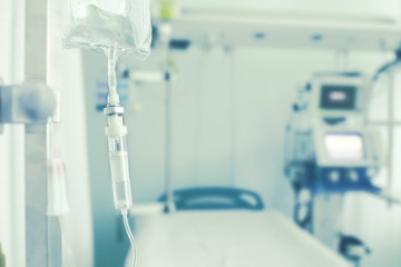  Medical drip in empty hospital ward