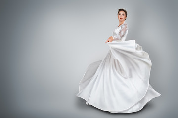 Fototapeta na wymiar Bride in beautiful wedding dress