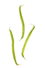 string beans on white surface.