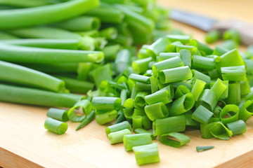 Spring onion on the wooden table