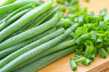Spring onion on the wooden table