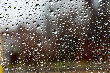 Muted colors raindrops windshield