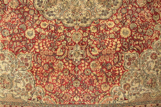 Colorful tapestry hanging in a shop in the Christian Quarter in Jerusalem, Israel.  Also known as the Muristan.