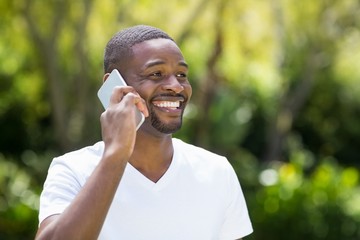Happy man talking on the phone