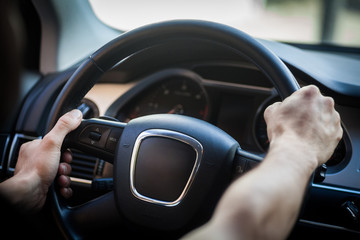 Hands on steering wheel