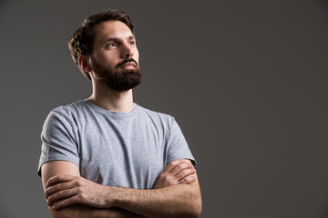 Bearded man crossed arms - Powered by Adobe
